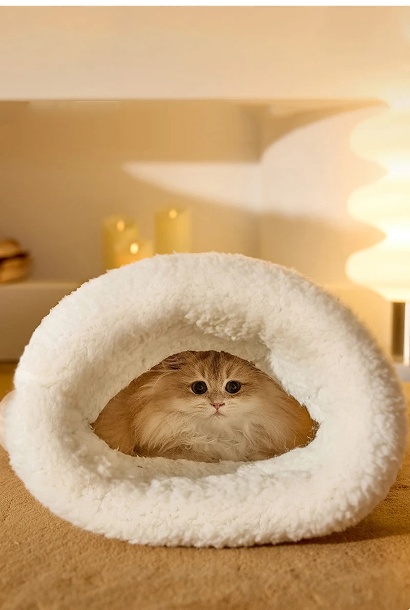 Cozy heated bed for kittens with plush material and winter-ready warmth.