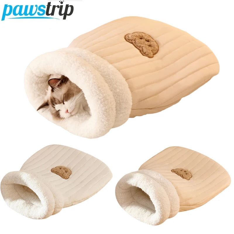 Soft plush heated cat bed for winter warmth and comfort.