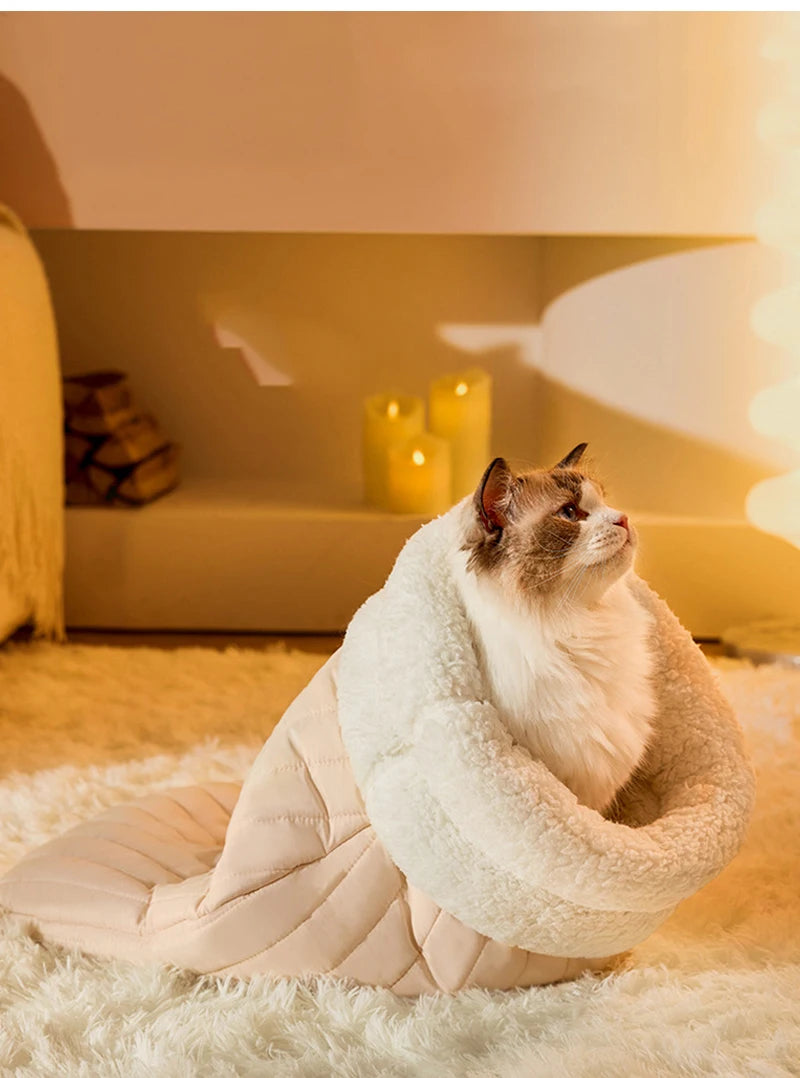 Heated pet bed for cats, designed to keep your pet warm during cold weather.