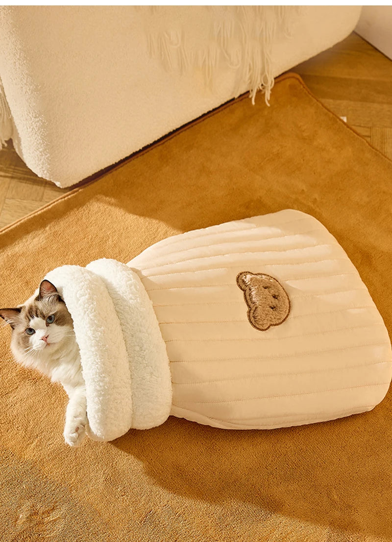 Heated plush cat bed designed for warmth, comfort, and winter use.