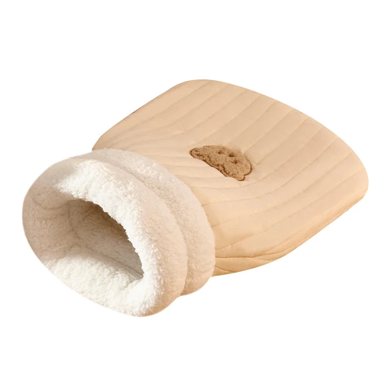 Heated plush cat bed, providing warmth and comfort for pets in winter.