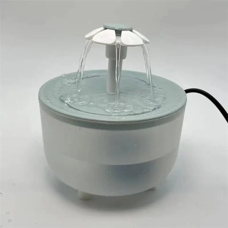 Recirculating water dispenser for cats and kittens.