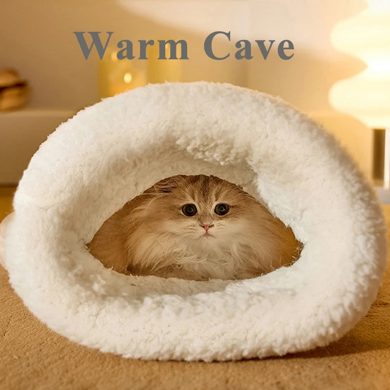 Soft and heated cat bed with plush fabric for ultimate comfort.