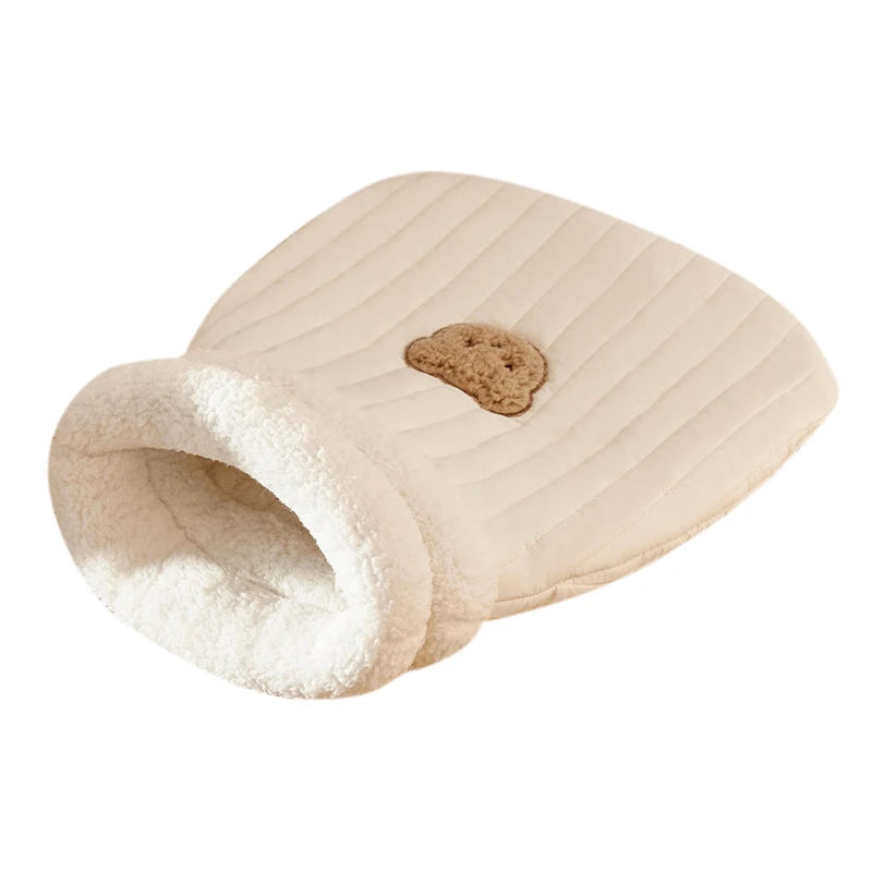 Heated winter tunnel cat bed that combines warmth and fun for cats.