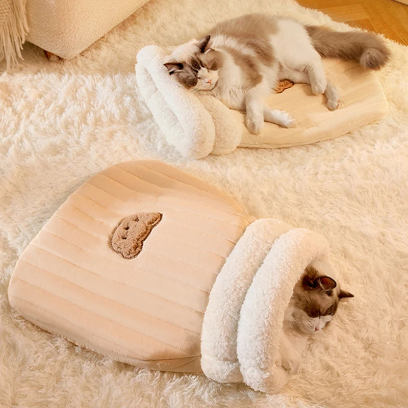 Cozy heated cat sleeping bag with plush material, perfect for colder months.